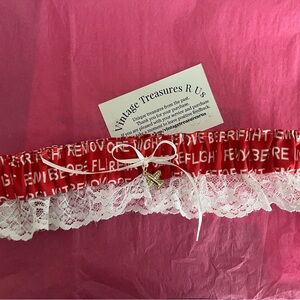 Red Remove before flight Lace Pilot Wedding Garter.
red Remove before flight